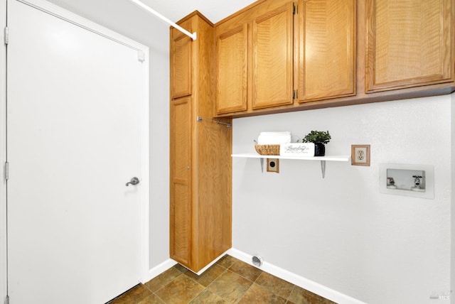 laundry room featuring cabinets, washer hookup, and hookup for an electric dryer