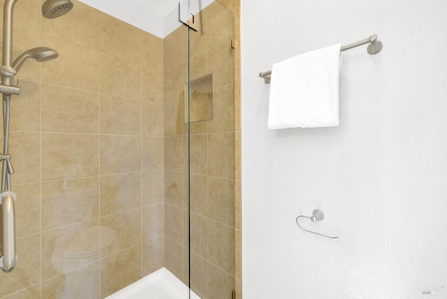 bathroom with an enclosed shower