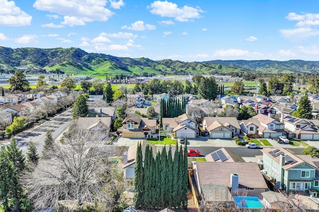 bird's eye view with a mountain view