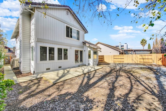 back of house featuring a patio