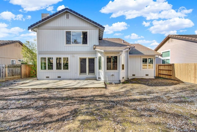 rear view of house with a patio