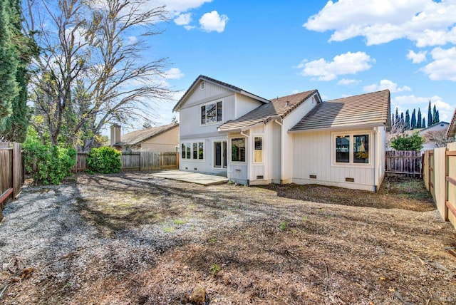 rear view of house featuring a patio