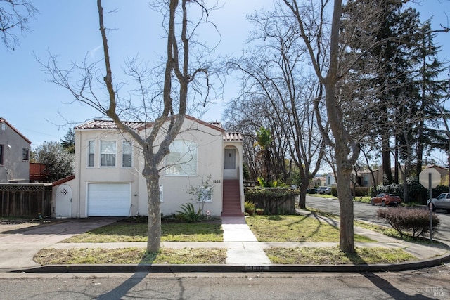 view of front of property with a garage