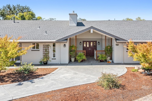 ranch-style home featuring french doors