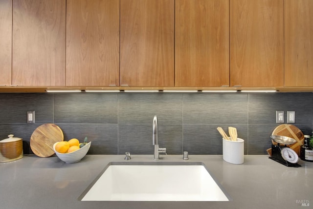 laundry area featuring a sink