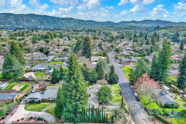 bird's eye view with a residential view and a mountain view