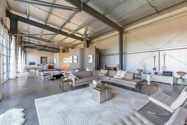 living room with concrete floors