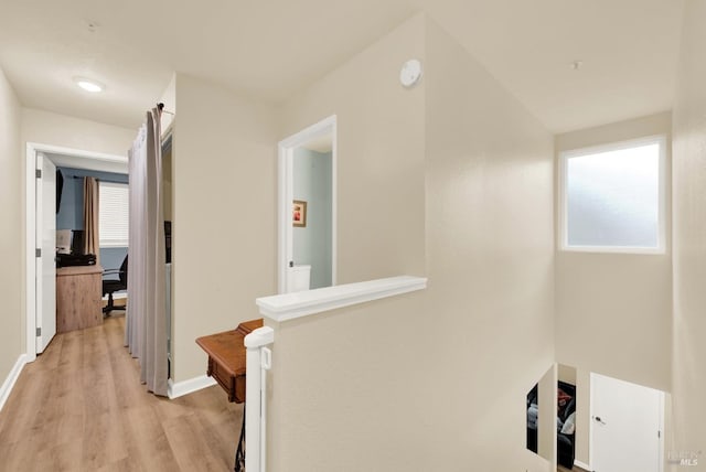 hallway featuring light hardwood / wood-style floors