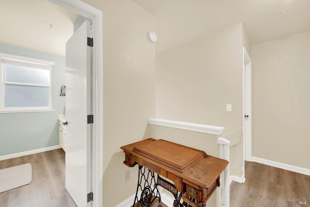 hall featuring hardwood / wood-style flooring