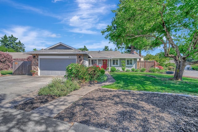 ranch-style home with a garage and a front yard