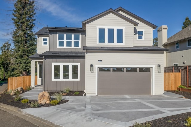 view of front facade with board and batten siding, driveway, and fence