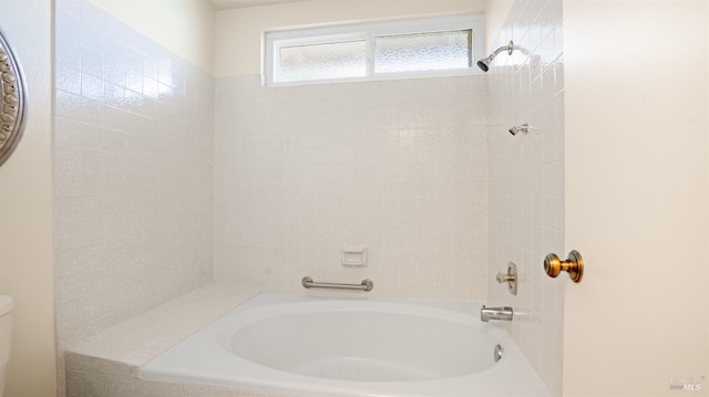 full bathroom featuring toilet