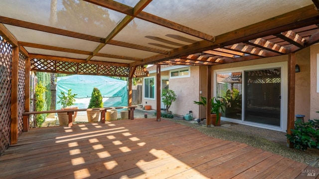 wooden terrace with a pergola
