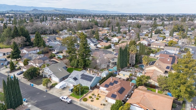 bird's eye view with a residential view and a mountain view
