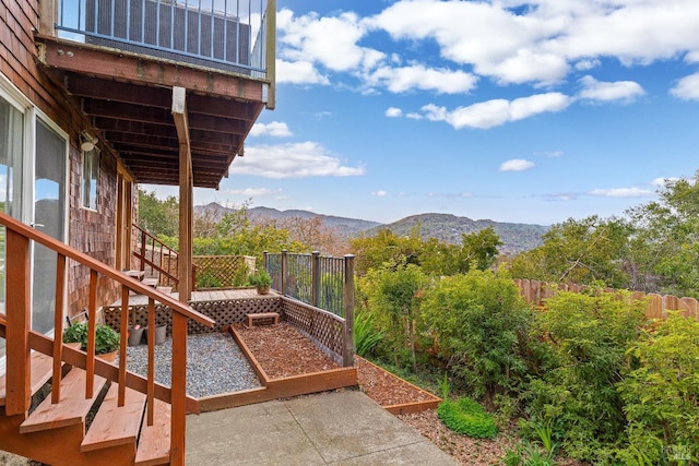 569 Sequoia Ave, San Anselmo, CA 94960 - wooden deck featuring a vegetable garden, a mountain view, fence, and stairs