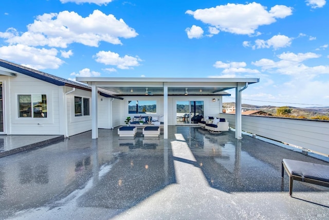 exterior space featuring an outdoor hangout area
