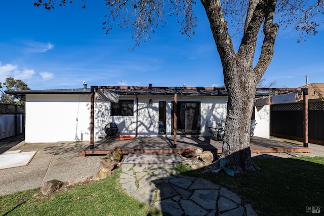 rear view of house with a patio area