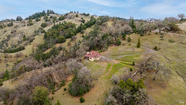 birds eye view of property with a rural view