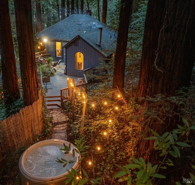 exterior space featuring a wooden deck