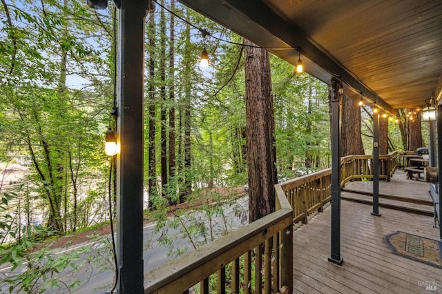 wooden terrace featuring a porch