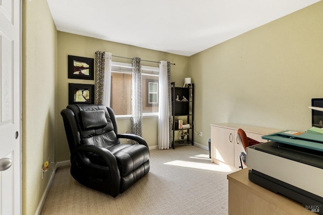 office with light colored carpet and baseboards