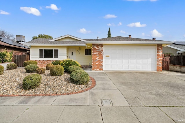 ranch-style home featuring a garage