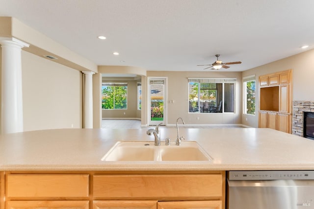 kitchen featuring a ceiling fan, ornate columns, recessed lighting, a sink, and dishwasher