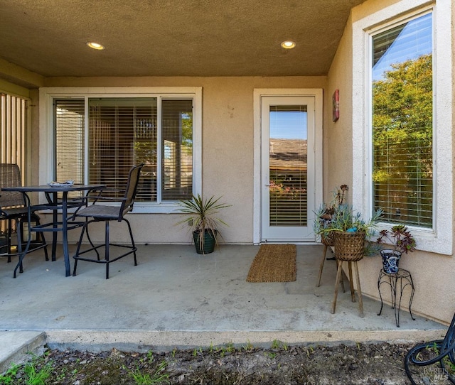 view of patio with outdoor dining area