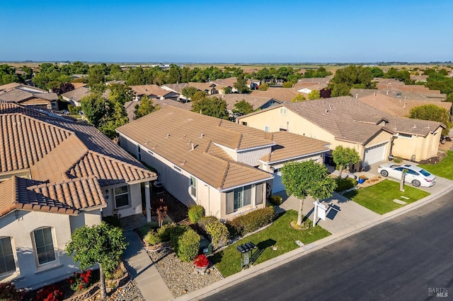 drone / aerial view with a residential view