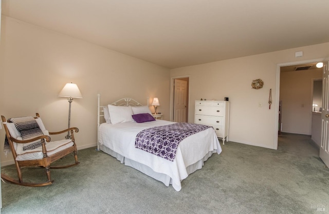 bedroom with baseboards and carpet flooring