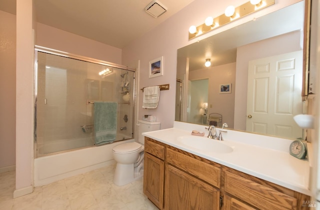 bathroom with visible vents, bath / shower combo with glass door, toilet, and vanity