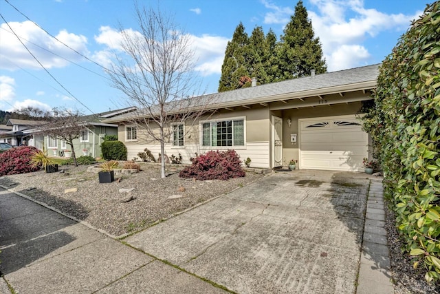 ranch-style home with a garage