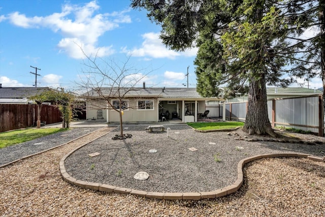 rear view of house with a patio area