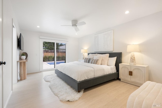 bedroom with access to exterior, light hardwood / wood-style floors, and ceiling fan