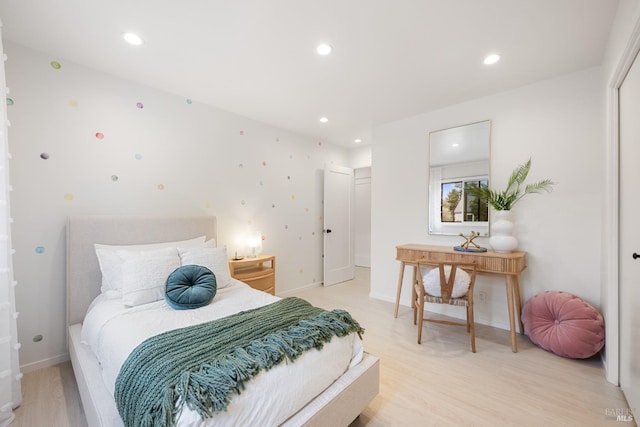 bedroom featuring light wood-type flooring