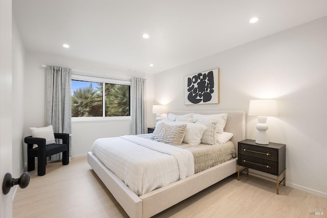 bedroom featuring light hardwood / wood-style floors