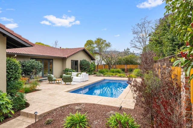 view of swimming pool with an outdoor hangout area and a patio