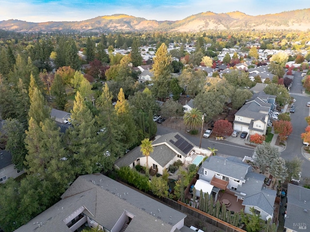 drone / aerial view with a residential view and a mountain view