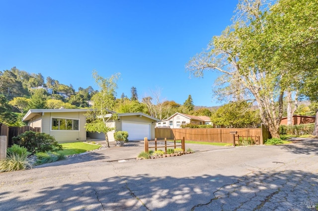 single story home featuring a garage