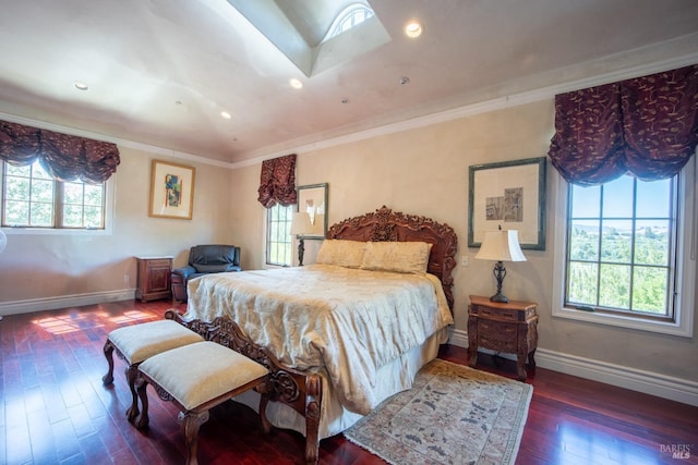 bedroom with dark hardwood / wood-style flooring and crown molding