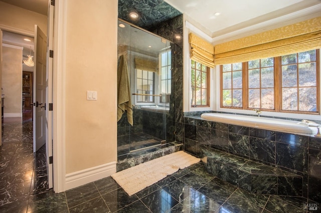 bathroom featuring ornamental molding and plus walk in shower