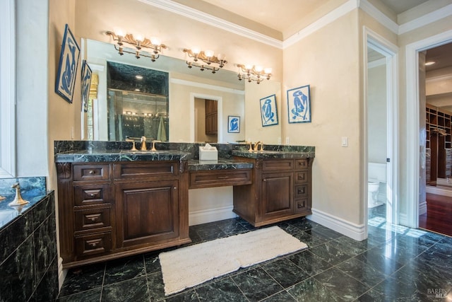 bathroom with a shower with door, ornamental molding, vanity, and toilet