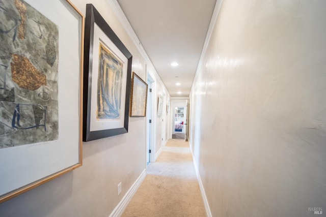 corridor with light colored carpet