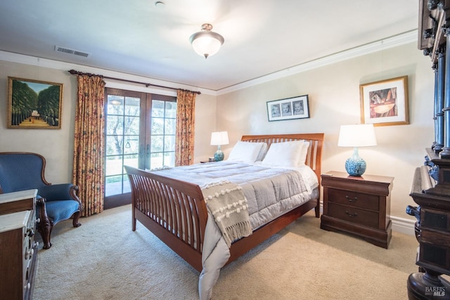 bedroom with light carpet, crown molding, and french doors