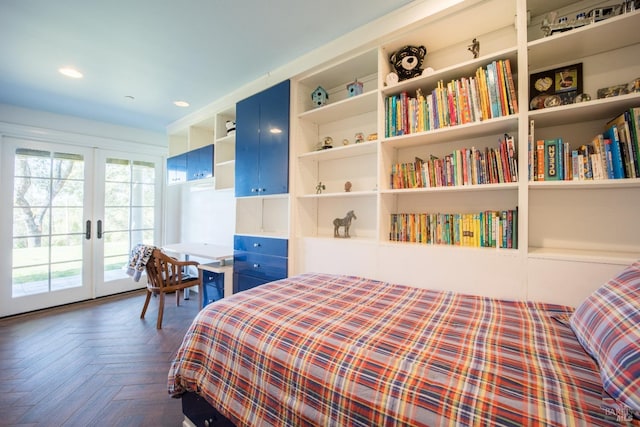 bedroom with french doors, dark parquet flooring, and access to exterior