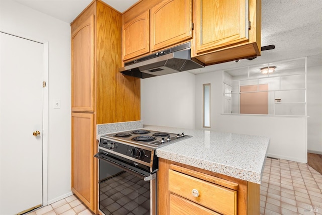 kitchen featuring light stone countertops, black electric range, and kitchen peninsula