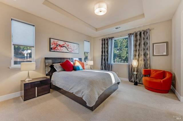 2228 Chateau Ct, Santa Rosa, CA 95404 - bedroom featuring light carpet, baseboards, visible vents, and a raised ceiling