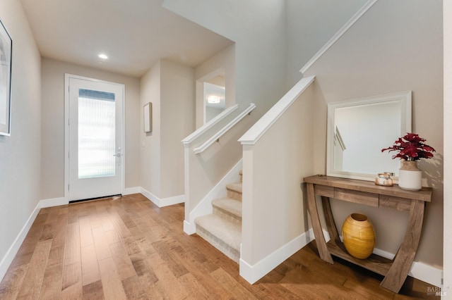 2228 Chateau Ct, Santa Rosa, CA 95404 - foyer entrance featuring light wood finished floors, stairway, and baseboards