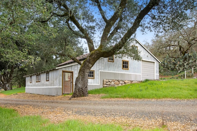 exterior space featuring a detached garage