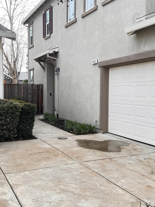 exterior space with a garage